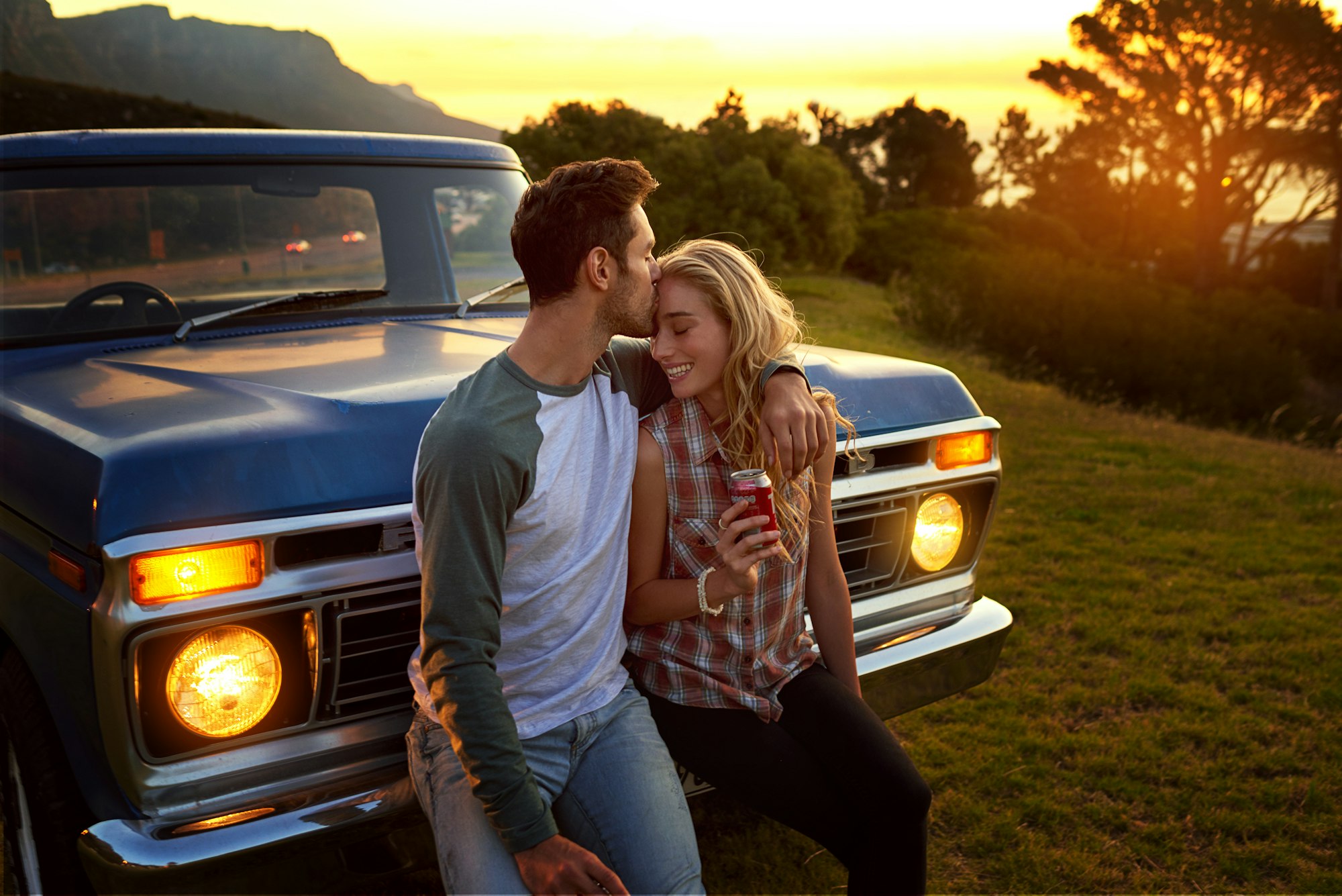 And just like that she knew she loved him. Shot of an affectionate young couple on a roadtrip.