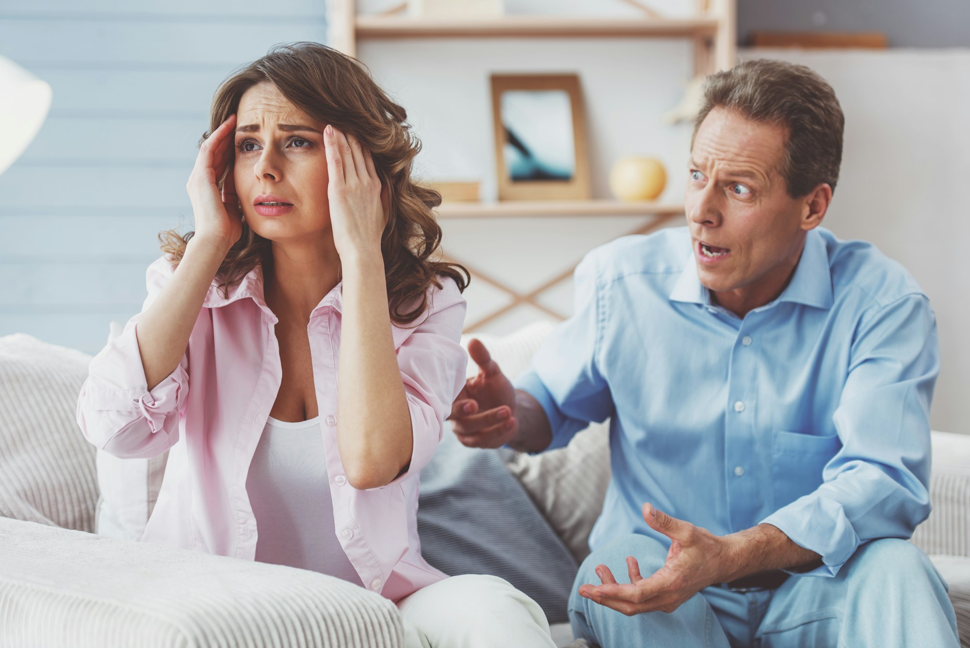 Couple quarreling at home