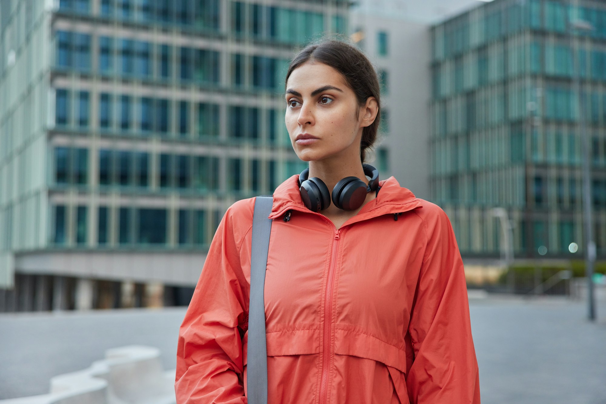 Fitness girl works hard on losing weight keeps fit strolls in city thinks about opening own gym uses