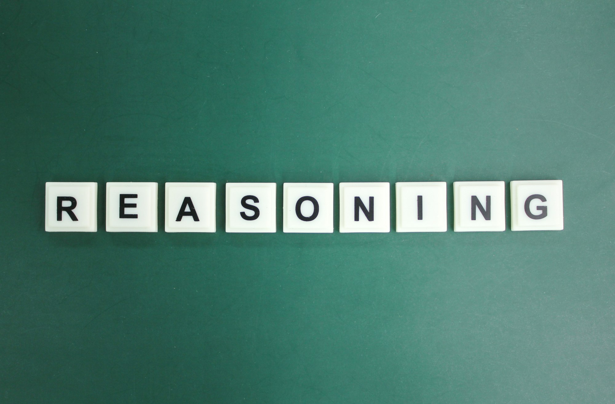 letters of the alphabet with the word Reasoning. reasoning concept.