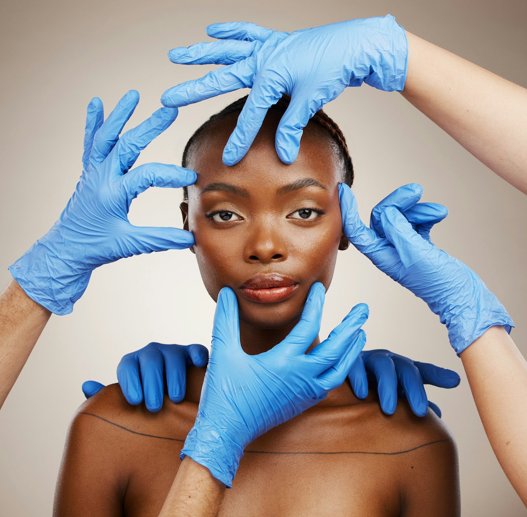 Portrait, hands and plastic surgery for change with a black woman patient in studio on a gray backg