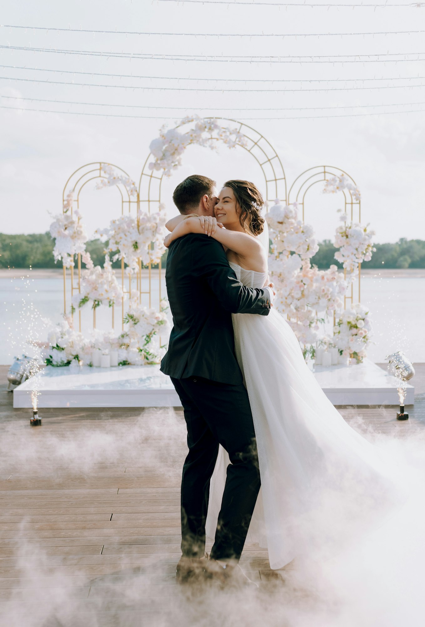 the first dance of the bride and groom inside a restaurant