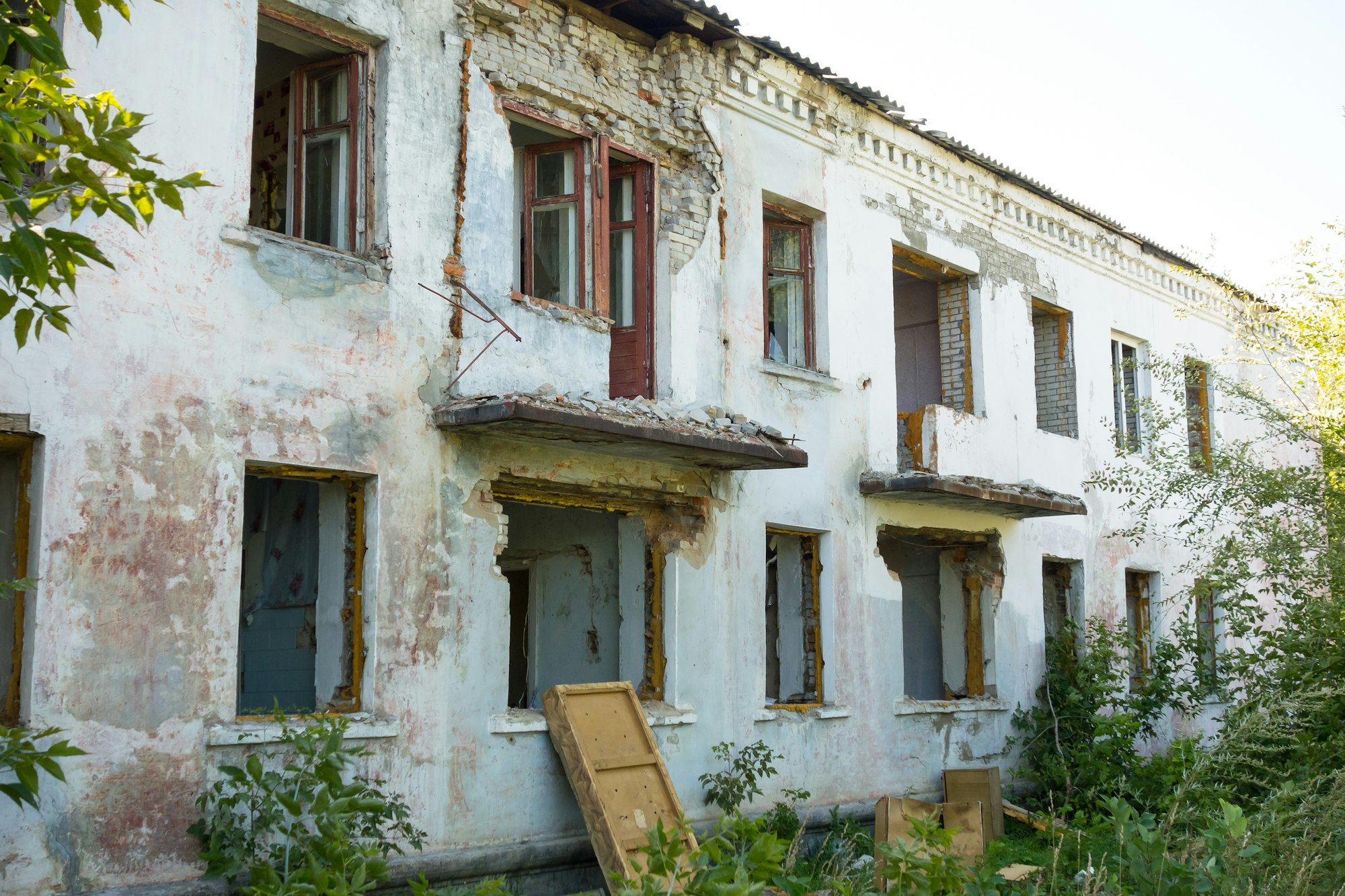 Old two-story brick house for demolition